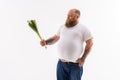 Thick guy do not like healthy food Royalty Free Stock Photo