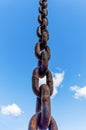 A thick iron chain to divert rainwater from close-up