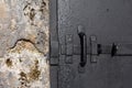 Thick iron door with a deadbolt in the bunker Royalty Free Stock Photo