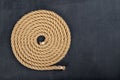 Thick jute rope coiled in the shape of a circle. Sailing accessories used on yachts Royalty Free Stock Photo