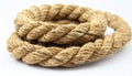 Thick jute rope coiled in a circular pattern with dark blue threads on a white background Royalty Free Stock Photo
