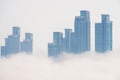 Thick large and heavy mist blow from the sea to the land and pass through skyscrapers and cover all other buildings in the area. Royalty Free Stock Photo