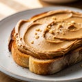 With a thick layer of creamy peanut butter, sprinkled with small Royalty Free Stock Photo
