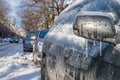 Thick layer of ice on car after freezing rain