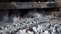 Thick layers of ash line the bottom of the incineration chambers a byproduct of the burning process Royalty Free Stock Photo