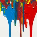 Thick layers of blue, red, and yellow paint drip vertically down a white canvas, creating Royalty Free Stock Photo