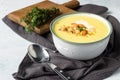 Thick milky chowder soup with seafood served with sour cream, thyme and pepper.