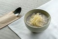 Thick mushroom cream soup with grated cheese.