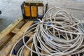 Thick powerful white cable and old transformer welding machine with copper winding