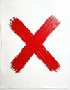 Thick red paint forms a large cross mark on a plain white paper surface. The brush strokes are visible creating a rough, textured Royalty Free Stock Photo