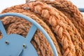 Thick rope coiled on deck of ship or yacht Royalty Free Stock Photo