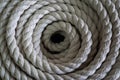 The thick rope twisted in a roll. The top view on a rope spiral. The rope curtailed into a circle Royalty Free Stock Photo