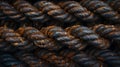 Thick ropelike threads tightly coiled and twisted together creating a dense and tangled texture Royalty Free Stock Photo