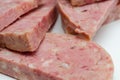 Thick slices of delicious brawn, cold cut made with flesh from the head of a pig in aspic Royalty Free Stock Photo