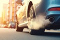 Thick smoke and exhaust gases emitted from car exhaust pipes. The problem of air pollution. The impact of cars on climate change Royalty Free Stock Photo