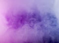 Thick smoke in the neon light. Pink and blue light, texture, background. Out of focus. Abstract dark background Royalty Free Stock Photo