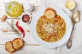 Thick soup with vegetables carrots, onions, tomatoes, pasta, lentils, cheese and spices. Minestrone Royalty Free Stock Photo