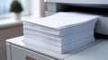 Thick stack of blank paper resting on office printer tray Royalty Free Stock Photo