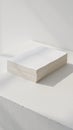 Thick stack of blank white paper sheets on textured white surface, clean minimalist background Royalty Free Stock Photo