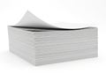 A large stack of white paper sheets with top sheet curled up on white background Royalty Free Stock Photo
