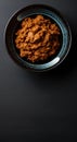 Thick Textured Bumbu Spice Paste in a Dramatic Dark Bowl Royalty Free Stock Photo