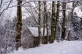 Old wooden hut in a romantic snowy landscape Royalty Free Stock Photo