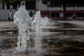 Thick water jets of a park fountain. Water splash, close up. Royalty Free Stock Photo