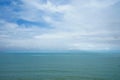 thick white clouds over blue sea water and horizon Royalty Free Stock Photo