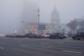 Thick white fog in Moscow. Cars on the Garden Ring. Russia. November 2021 Natural phenomenon. Smog. Royalty Free Stock Photo