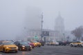 Thick white fog in Moscow. Cars on the Garden Ring. Russia. November 2021 Natural phenomenon. Smog. Royalty Free Stock Photo