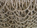Thick white gold intertwined close up rope designer background