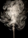 Thick white smoke isolated on a black, rising tubers upwards as an abstract effect Royalty Free Stock Photo