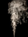 Thick white smoke isolated on a black, rising tubers upwards as an abstract effect
