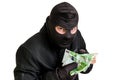 Thief in balaclava with stolen money isolated on white Royalty Free Stock Photo