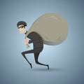 Thief in black clothes carrying a large bag Royalty Free Stock Photo