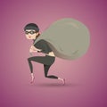 Thief in black clothes carrying a large bag Royalty Free Stock Photo