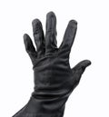 Thief with black glove Royalty Free Stock Photo