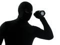 Thief criminal with flashlight silhouette Royalty Free Stock Photo