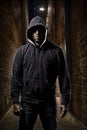 Thief on a dark alley Royalty Free Stock Photo