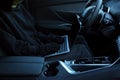 Thief hacking car system with laptop inside vehicle, closeup Royalty Free Stock Photo