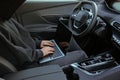 Thief hacking car system with laptop inside vehicle, closeup Royalty Free Stock Photo