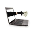 Thief hand with money from a laptop screen