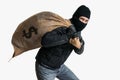 Thief robbed bank with full bag of money. Isolated on white background. Royalty Free Stock Photo