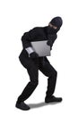 Thief running with laptop isolated