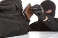 Thief stealing a wallet Royalty Free Stock Photo