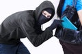 Thief stealing a wallet Royalty Free Stock Photo