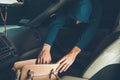 a thief steals bag in car. Royalty Free Stock Photo