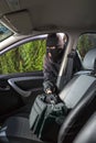 Thief steals bag from the car Royalty Free Stock Photo