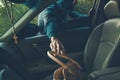 A thief steals bag in car Royalty Free Stock Photo