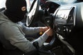 Thief using screwdriver in car Royalty Free Stock Photo